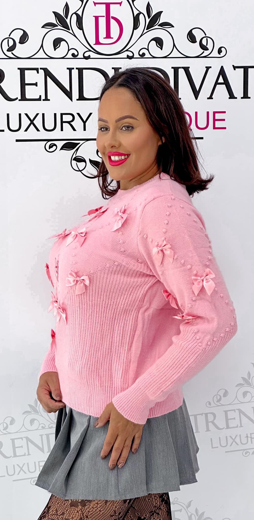 Knitted top with polka dots and bows - Image 9