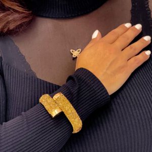 Bracelet with gold coloured stones