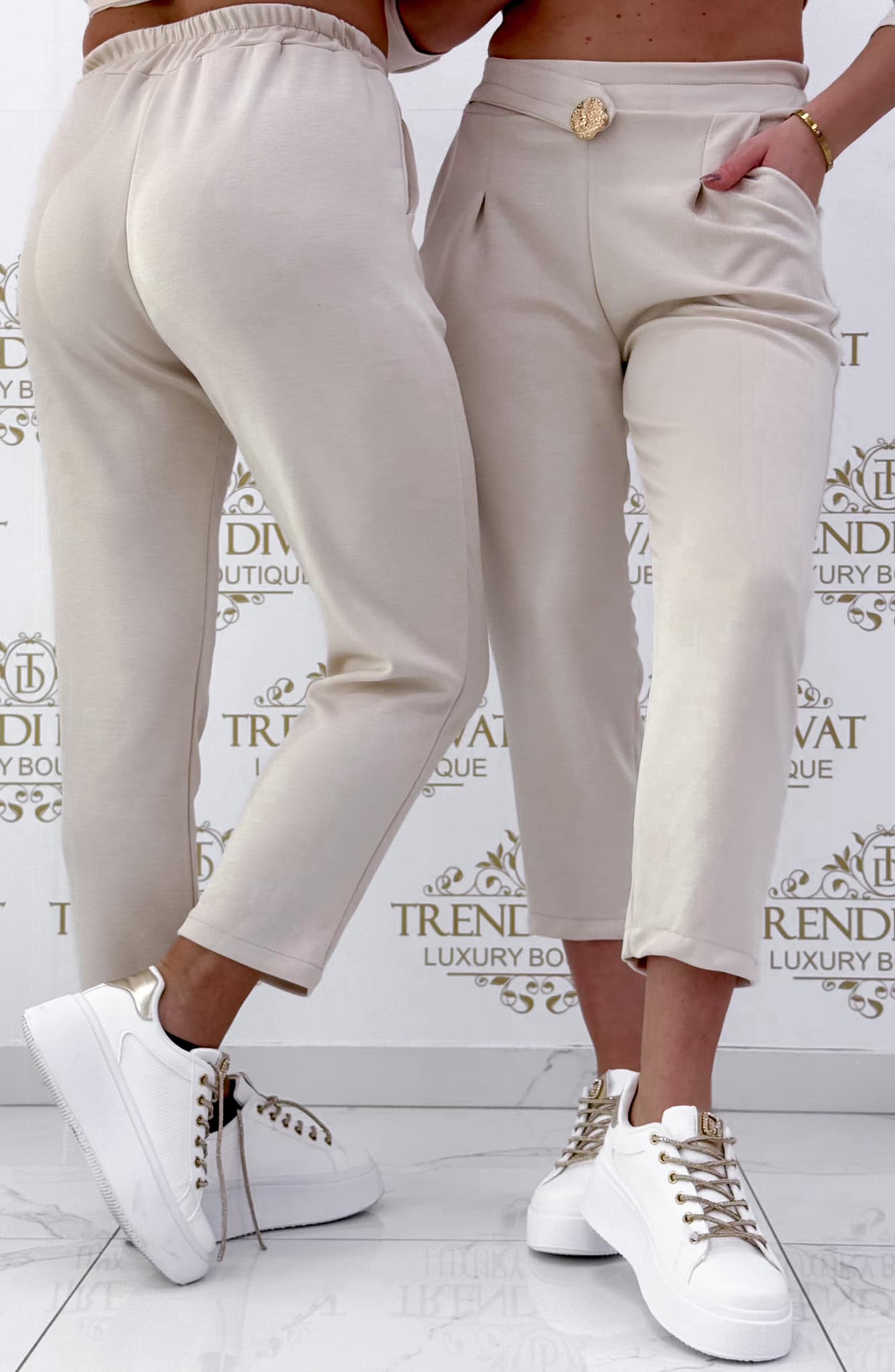 Trousers in soft fabric with large gold buttons - Image 9