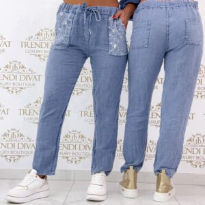 Pants with sequin inserts at the pockets, in a lightweight fabric