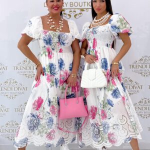 Puffy sleeves, elasticated bust, maxi dress with embroidered Madeira inserts and floral pattern