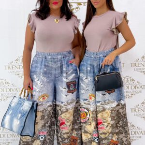 Elasticated waist, denim effect palazzo trousers with camo pattern inserts