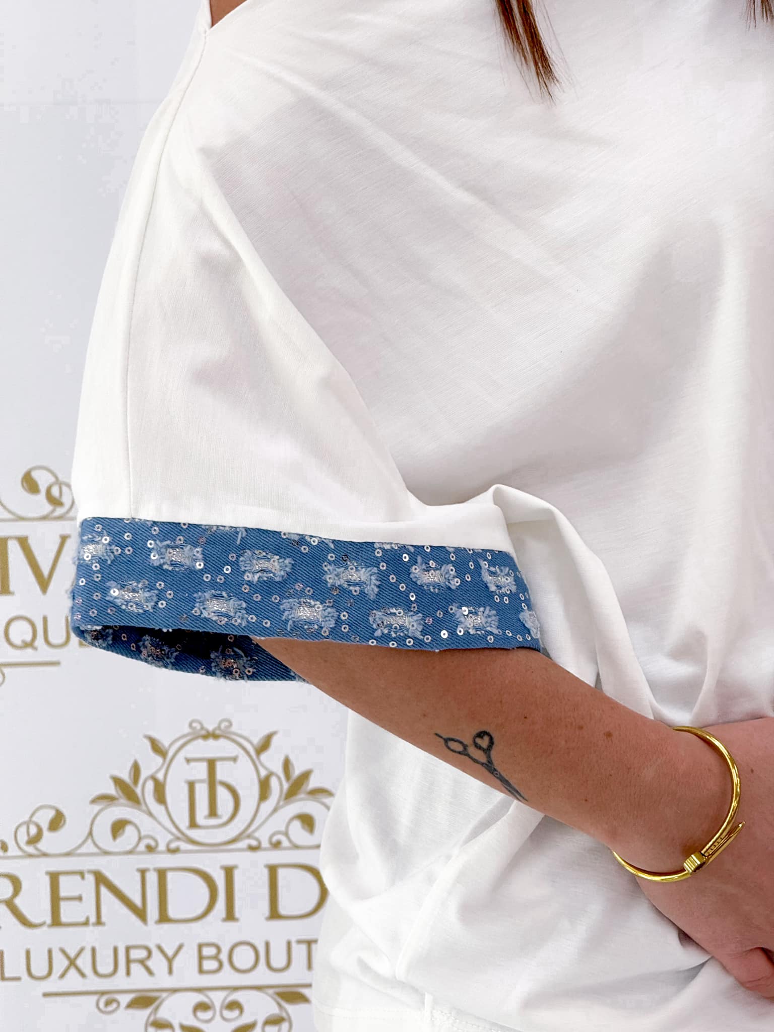 Boat neck top with sequined denim inserts and bias cut - Image 4