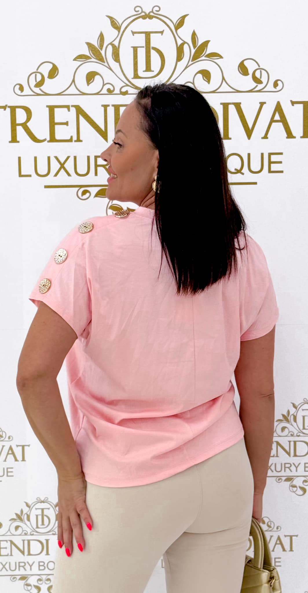 Loose-fit top with gold buttons on the sleeves - Image 10