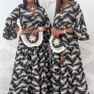 Gombos V-nyakú, mell alatt megkötős, különleges mintázatú, fodros maxi ruha